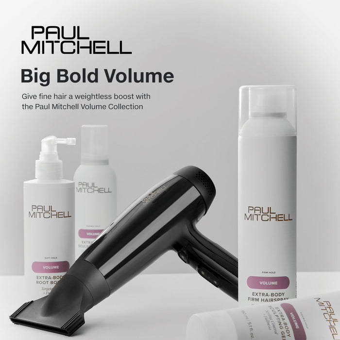 Paul Mitchell Volume Collection styling products with a black hair dryer on a grey studio background, designed to give fine hair weightless body and volume.
