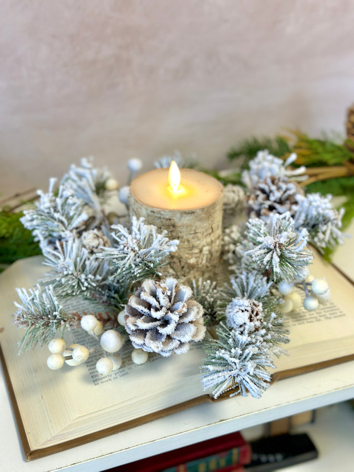 Close-up of winter fest pine candle ring detail from Magnolias Home Decor