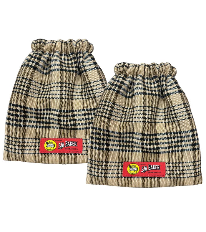 a pair of 5a baker plaid english stirrup covers on a white background