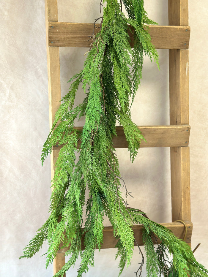 Close-up of winter cypress pine garland detail from Magnolias Home Decor