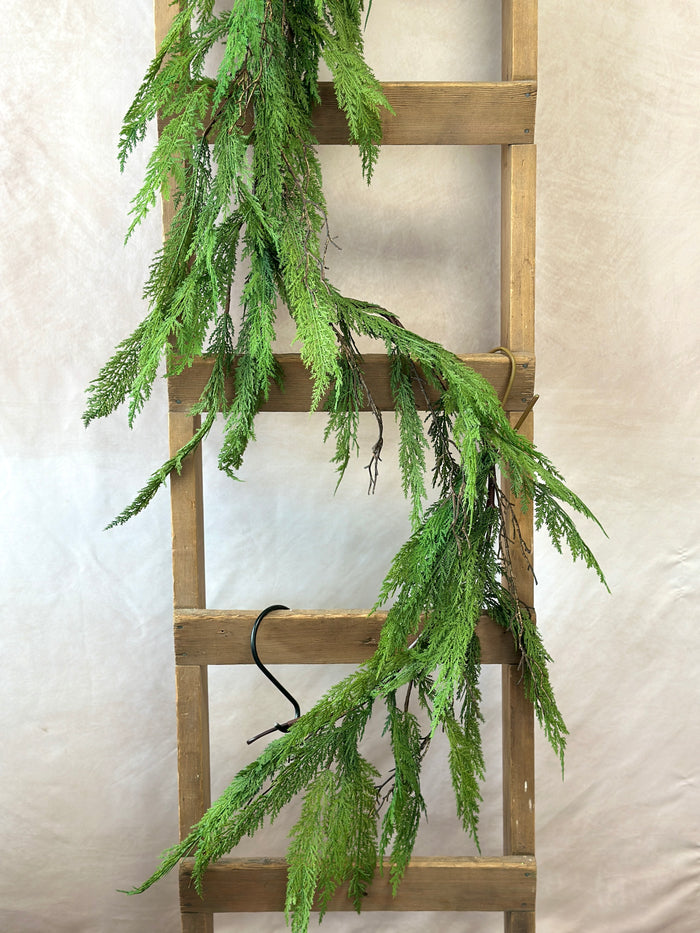 Winter cypress pine garland styled for Winter home decor from Magnolias Home Decor