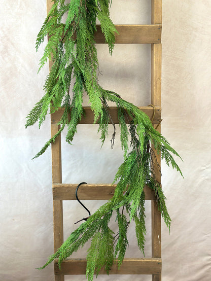 Winter cypress pine garland styled for Winter home decor from Magnolias Home Decor