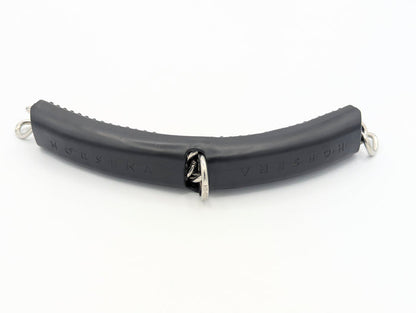 Black Horsena gel curb chain cover with integrated metal rings and center joint, designed to cushion curb pressure and prevent jaw irritation on sensitive horses.