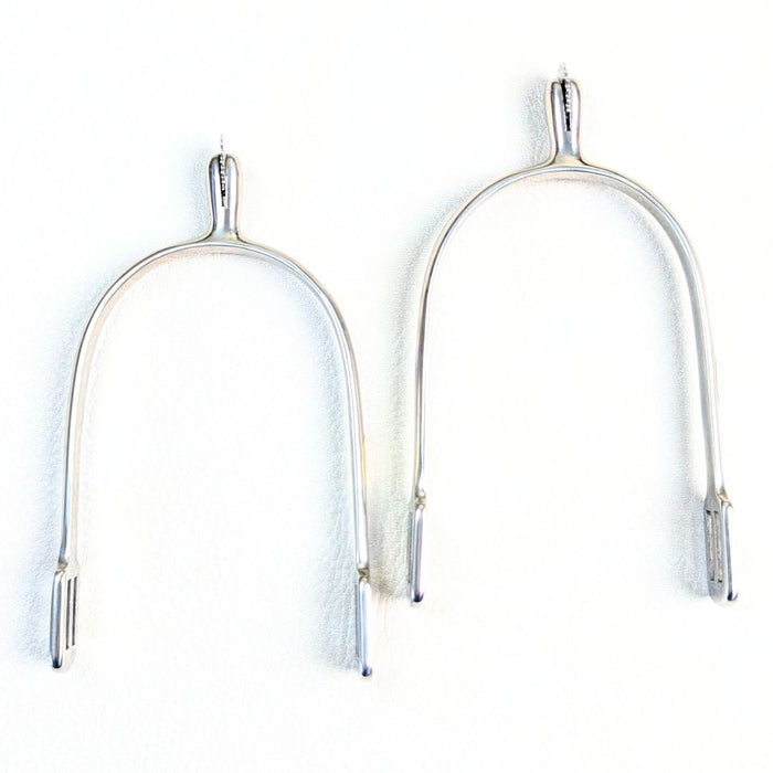 silver english spurs on a white background
