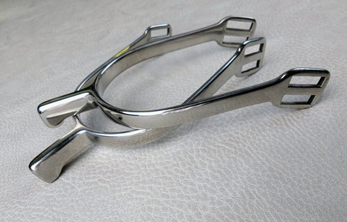 Stainless steel ladies hammerhead spurs with 25mm neck and rounded ends, shown on a light textured surface.