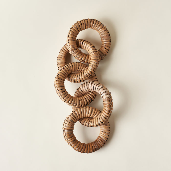 Decorative chain made of woven rattan and mango wood.