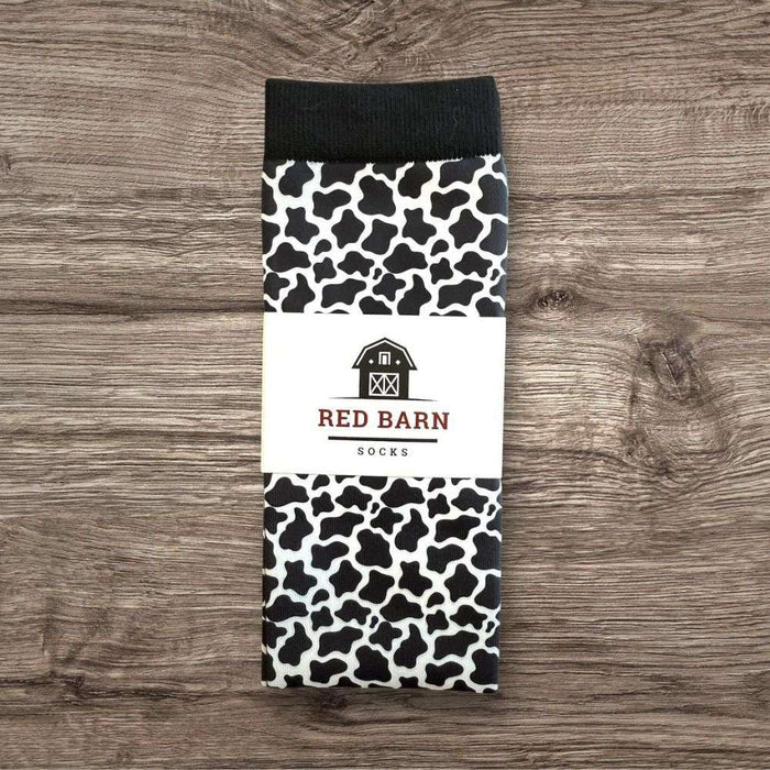 red barn tall socks udderly cozy petite height folded on a wooden background