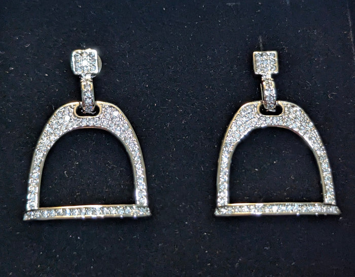 Pair of silver plated english stirrup earrings with pave cz's on a black velvet background