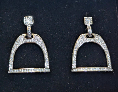 Pair of silver plated english stirrup earrings with pave cz's on a black velvet background