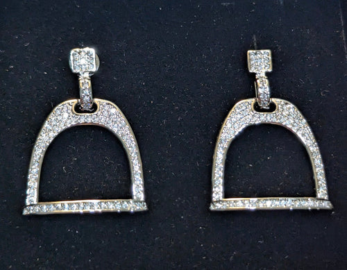 Pair of silver plated english stirrup earrings with pave cz's on a black velvet background