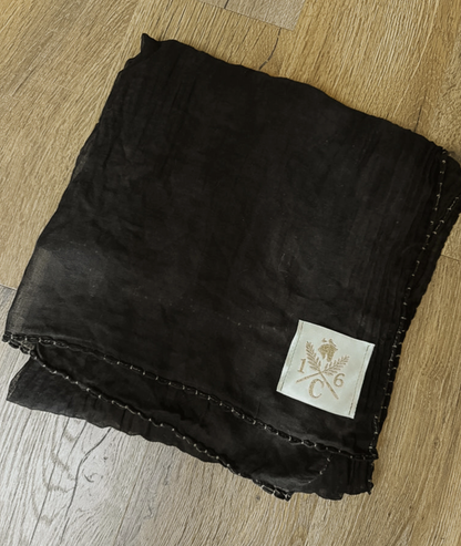 Folded black cotton voile scarf featuring the gold and ivory embroidered 16C logo patch