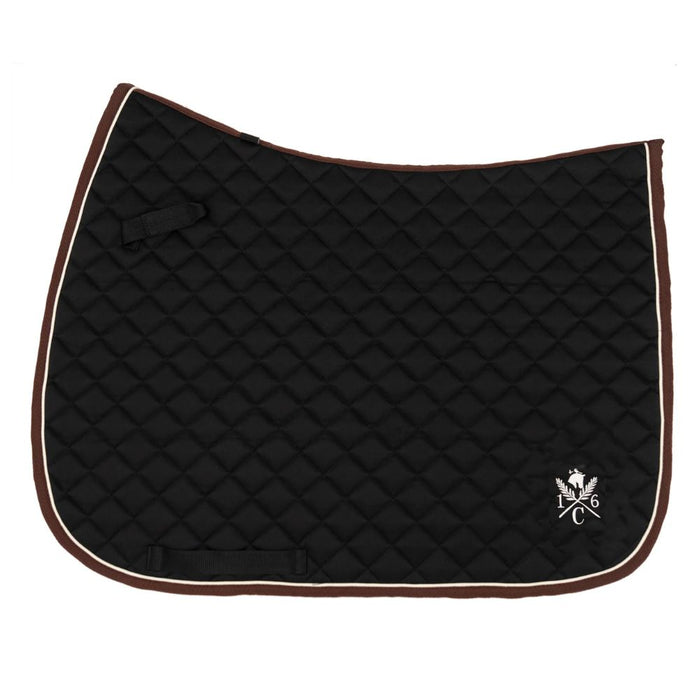 Black quilted jumper saddle pad with ivory piping, black binding, and ivory 16C crest