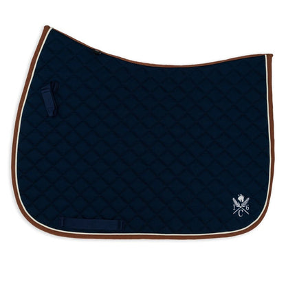 Navy blue quilted saddle pad with cognac binding and cream piping  on a white background